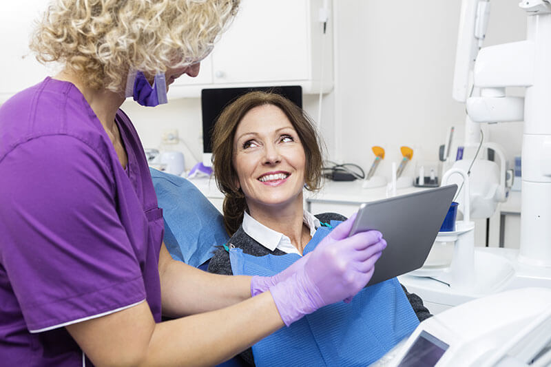 Middle-aged female patient smiling